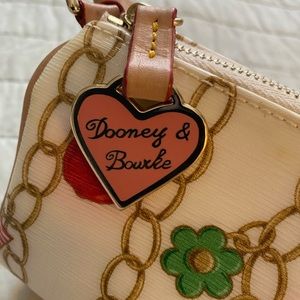 Doomed and Bourke mini barrel clutch purse with strap